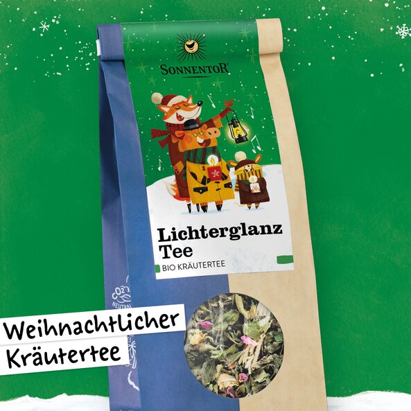 Sonnentor Lichterglanz Tee, loser Bio-Kräutertee in Verpackung mit Sichtfenster und Hinweis "weihnachtlicher Kräutertee"
